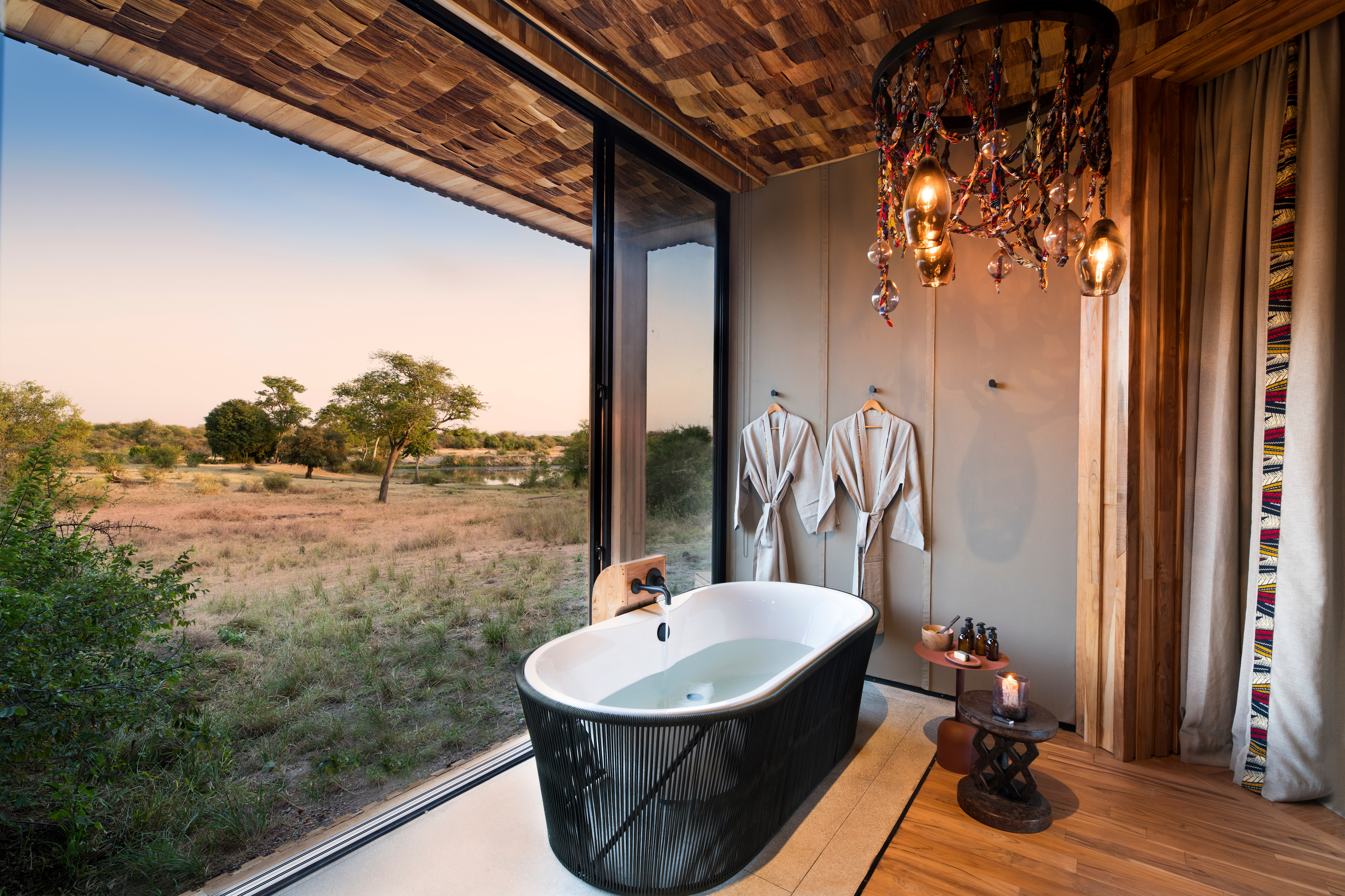 grumeti-serengeti-river-lodge-interior-exterior-room-suite-bathroom-01.jpg