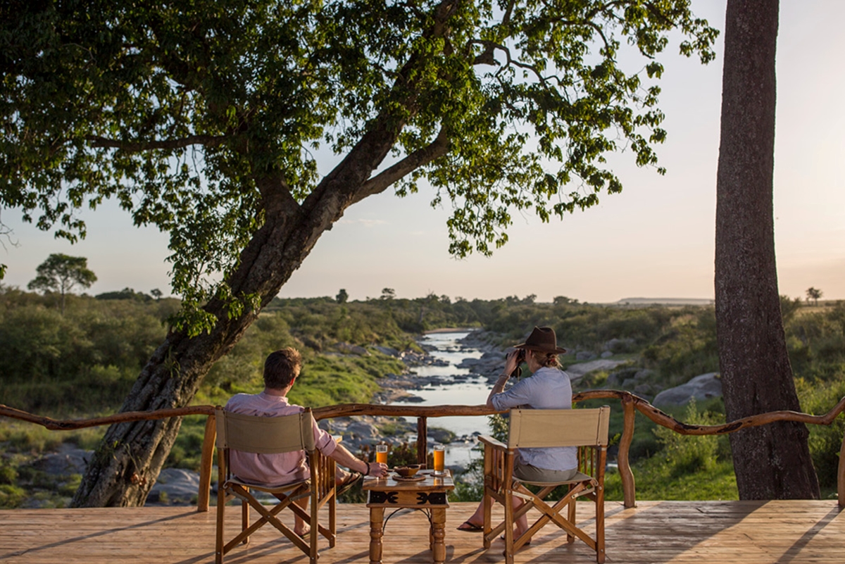 7. rekero-camp-guests-enjoying-views-from-the-deck.jpg