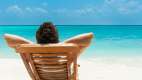 Young man resting on beach