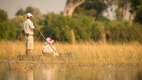 Two people on a Mokoro